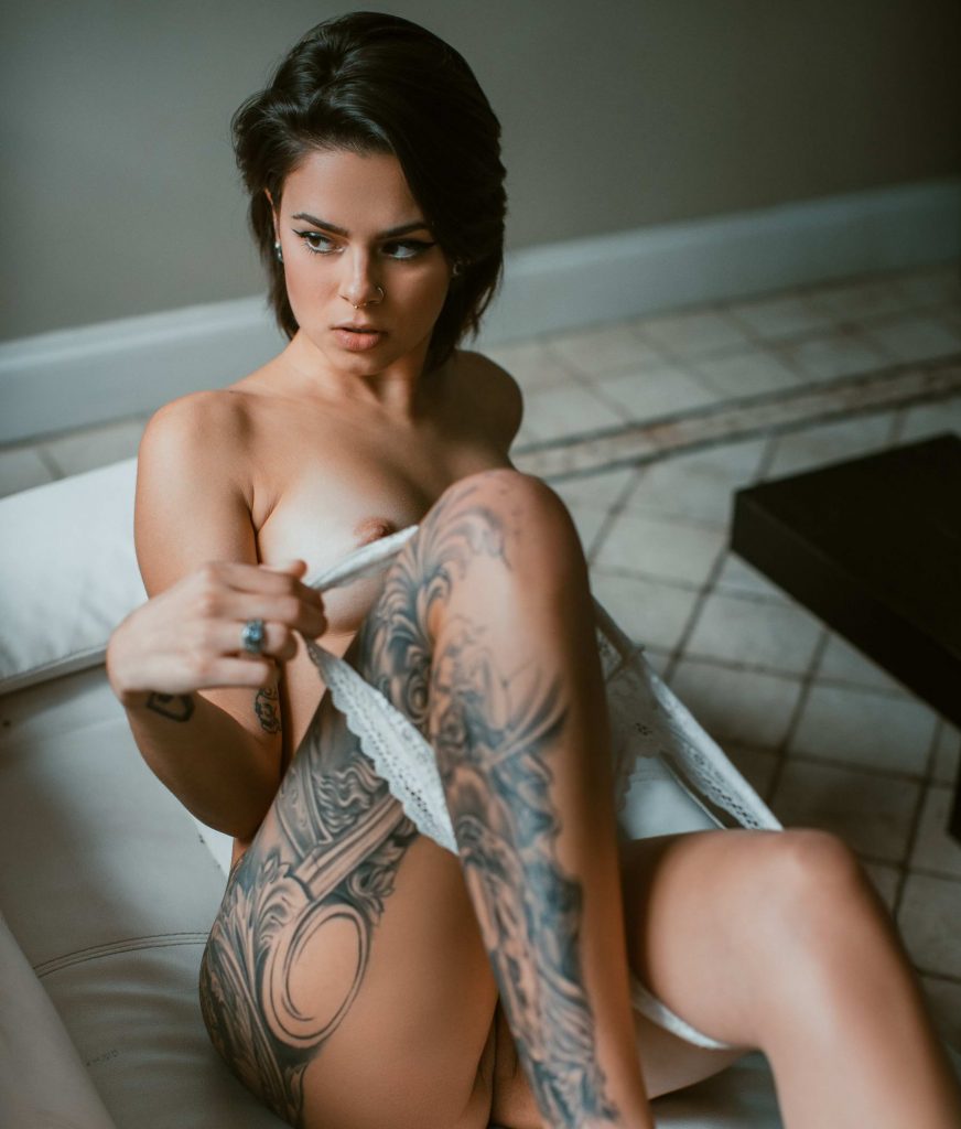 Sexy Tattooed Brunette Naked